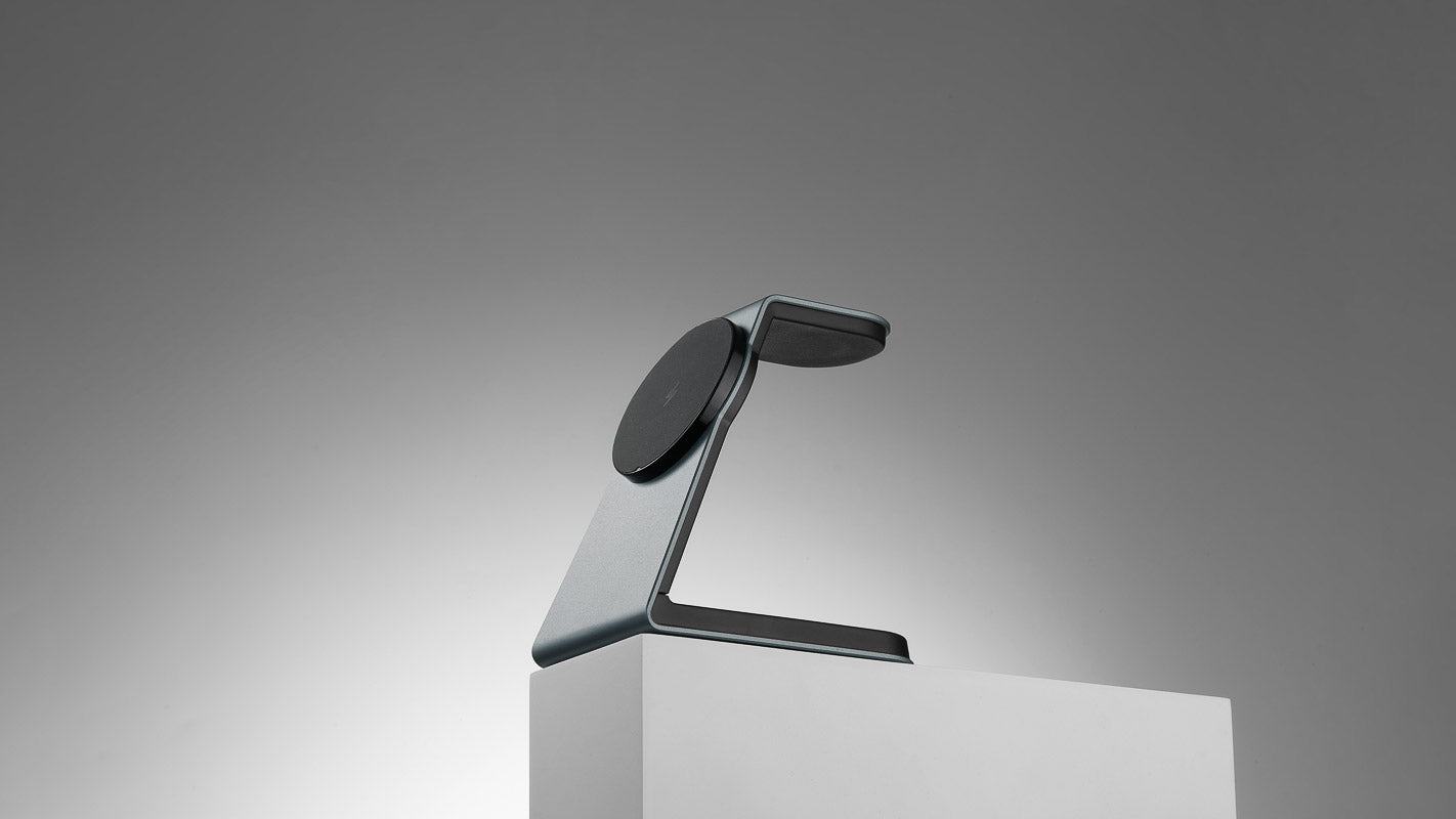 MODERN_STANDARD MagSafe Collection - Magnitis 3-in-1 Charger on a desktop, charging an iPhone, AirPods, and Apple Watch.