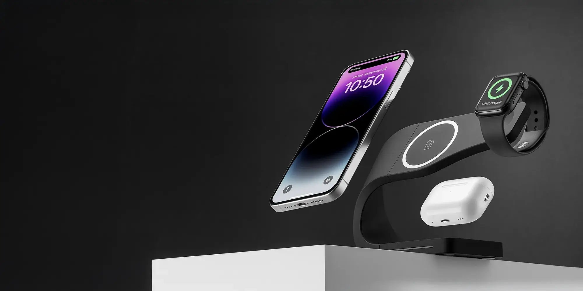 Modern Standard MagSafe charger stand in black showcasing simultaneous charging of iPhone, Apple Watch, and AirPods