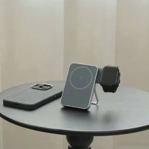 Load video: Video of Via MagSafe Portable Power Bank shown from different angles, with iPhone, Apple Watch