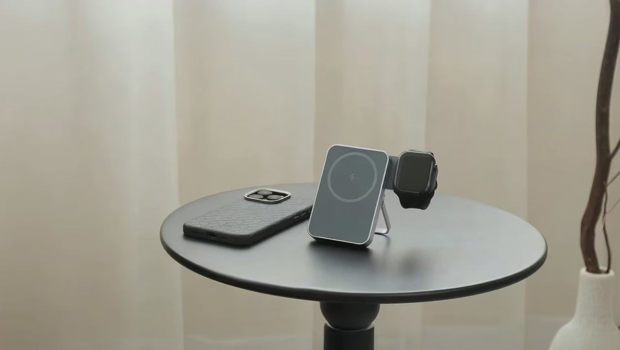 Load video: Video of Via MagSafe Portable Power Bank shown from different angles, with iPhone, Apple Watch