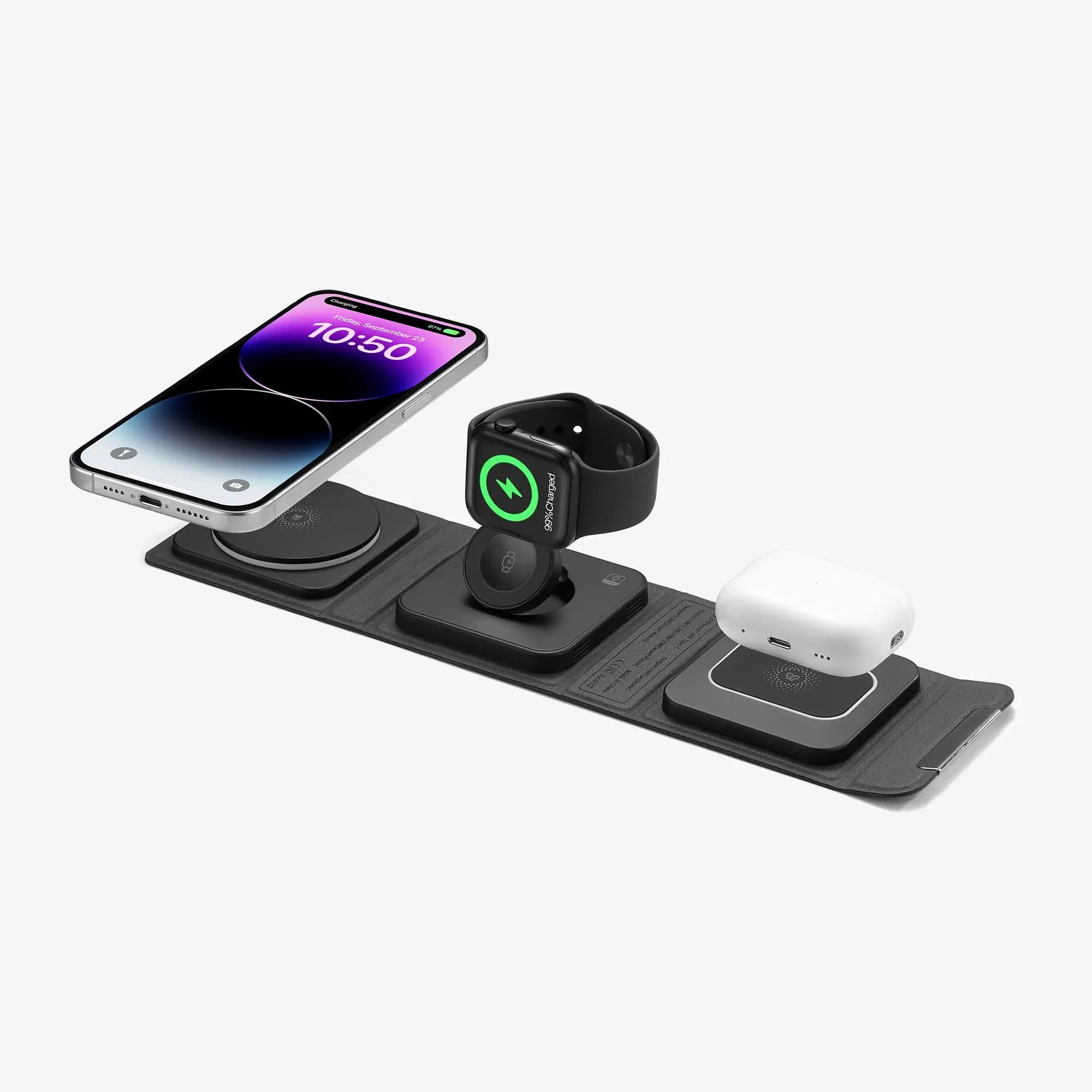 Cubica multi-device charger arranged with an iPhone, Apple Watch, and AirPods, showcasing its compact, foldable design.