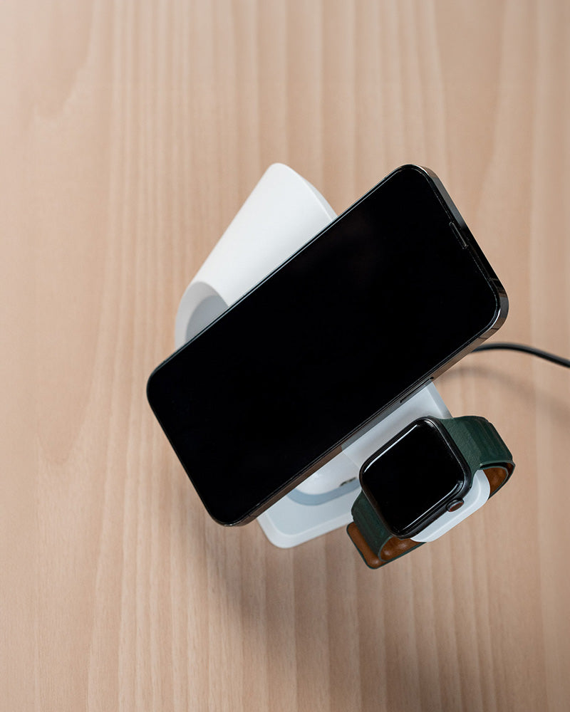 Modern Standard Simpli Charge White with iPhone, Apple Watch & AirPods on timber office desk