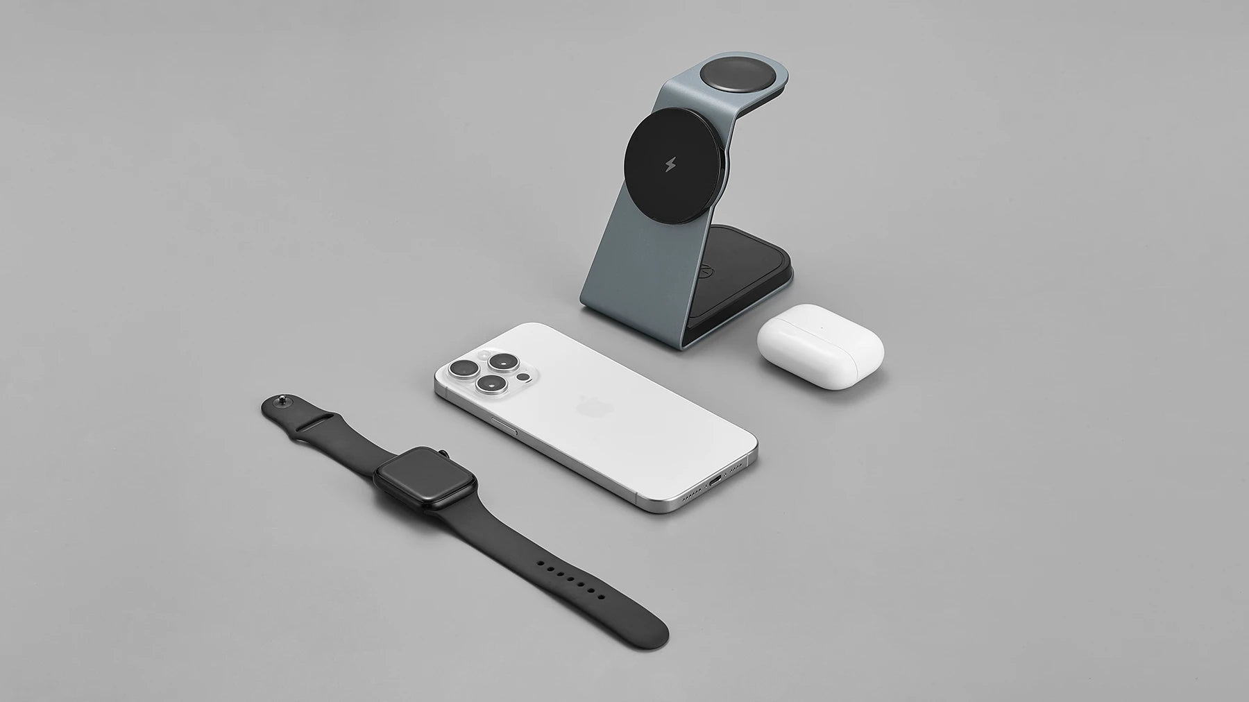 Magnitis 3-in-1 MagSafe charger in slate grey with iPhone, Apple Watch and AirPods setup | Modern Standard